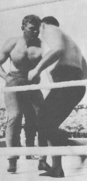 Old photograph of Frank Gotch and George Hackenschmidt wrestling in a ring